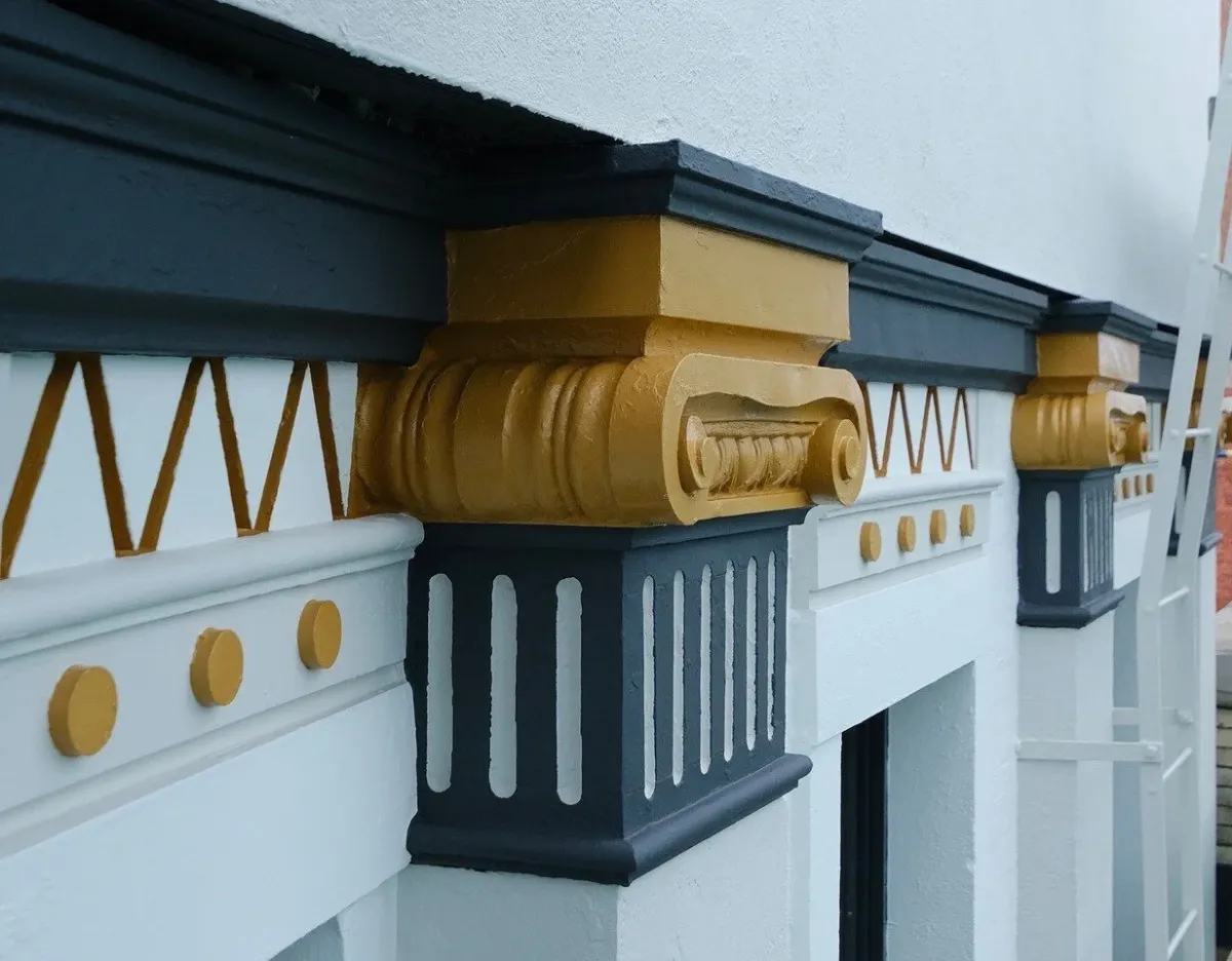 Restored moulding, gold on black