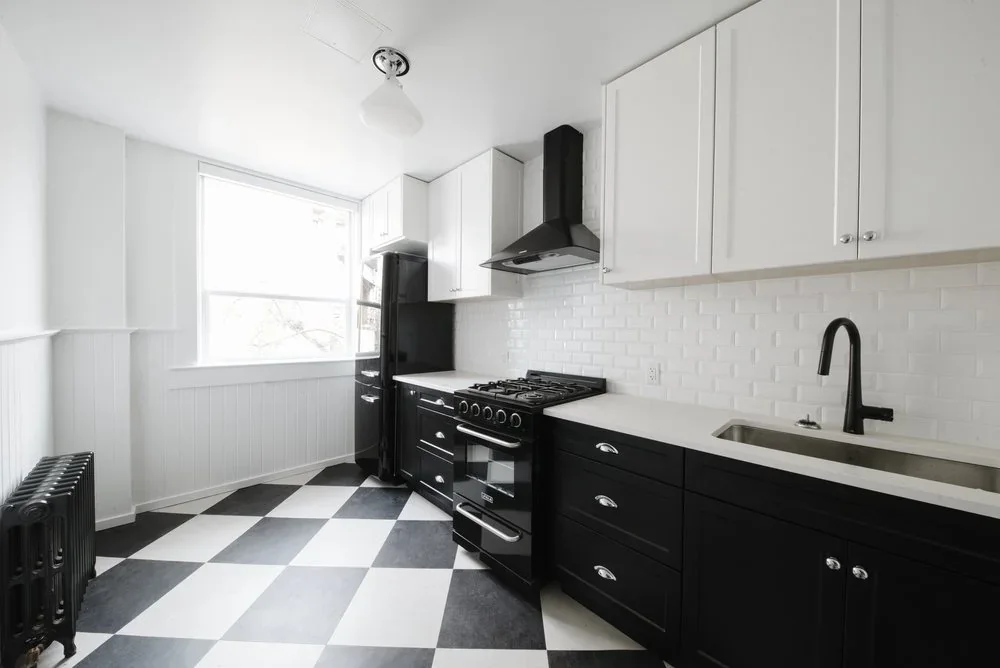 Kitchen on the Rigby floor with a chequerboard floor
