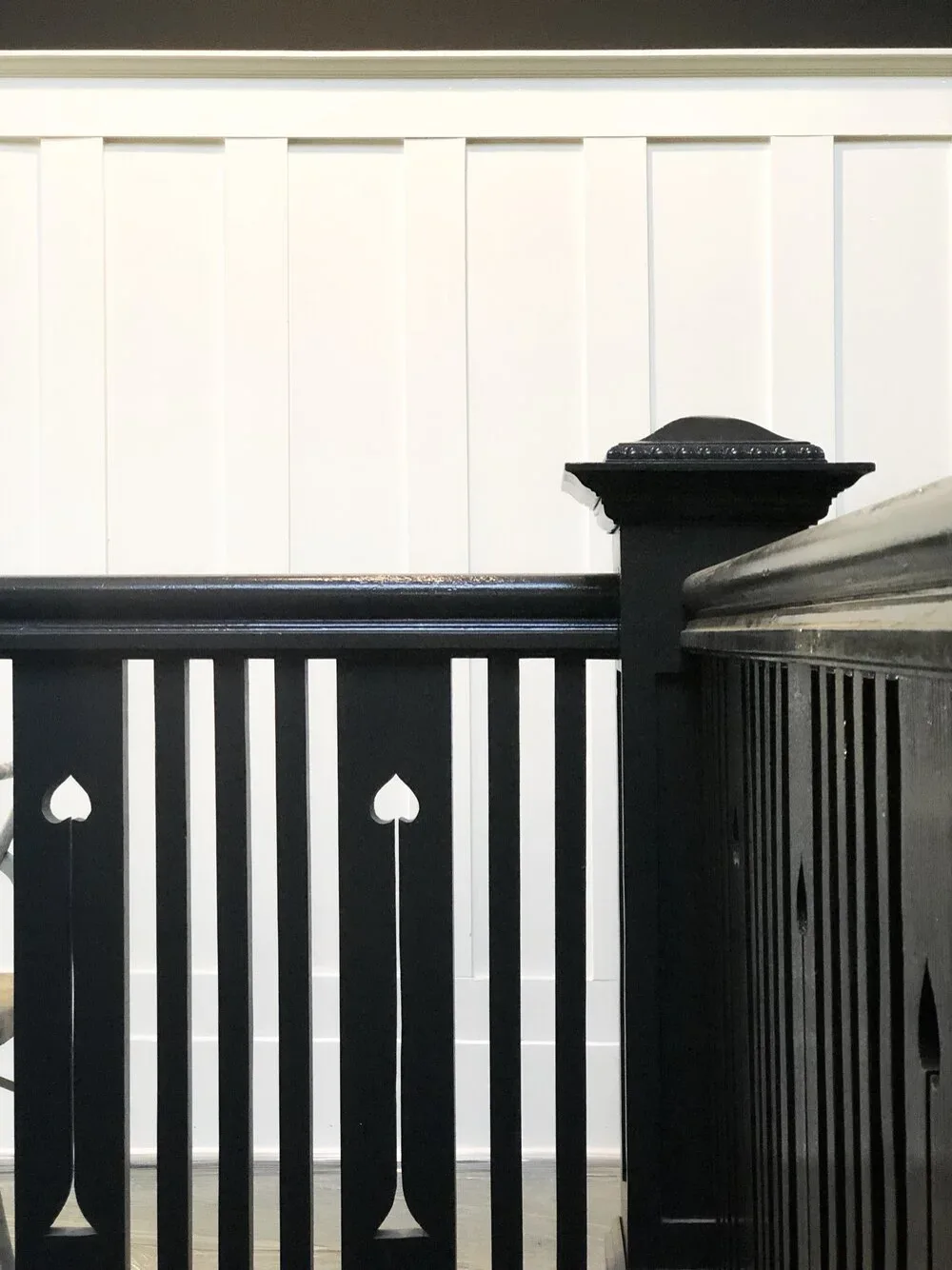 The restored original entry stair handrail