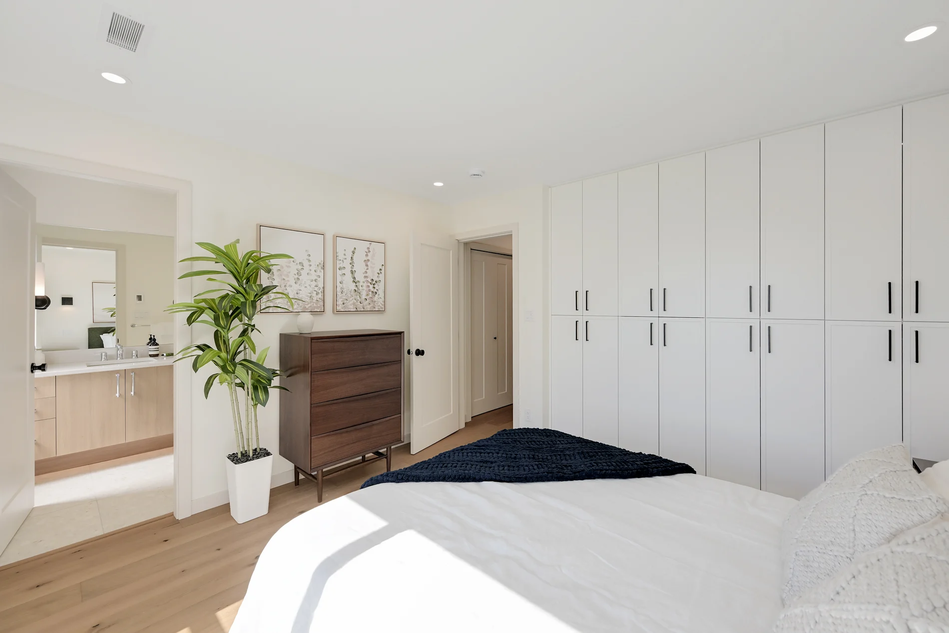 A bedroom looking through to the ensuite
