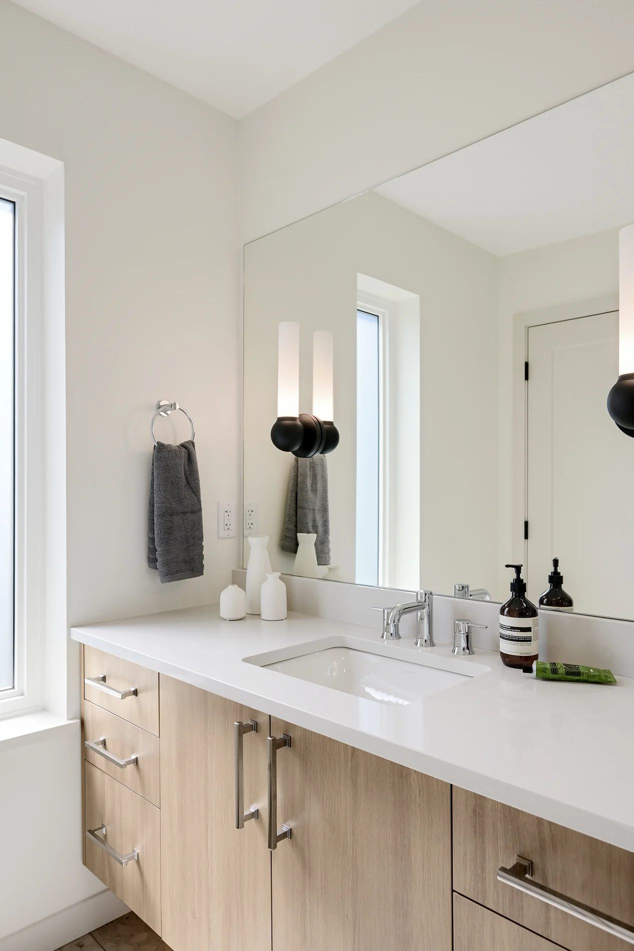 The ensuite vanity, the window beside the mirror
