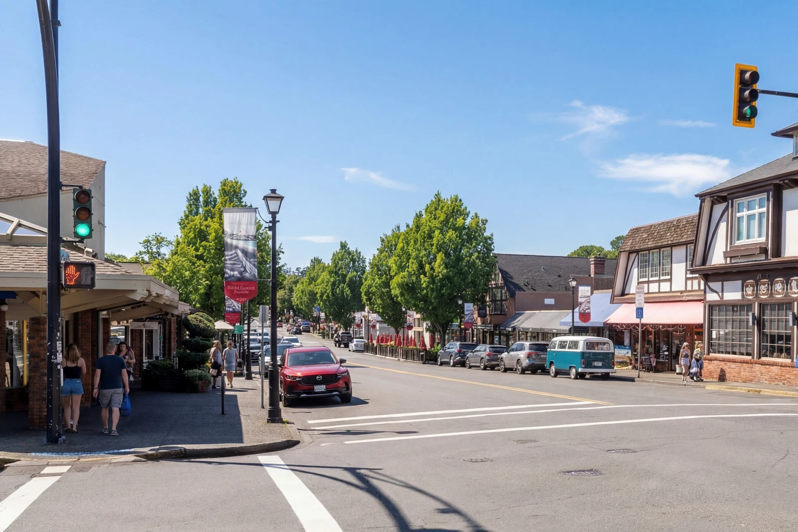 Oak Bay Village — patios and shopfronts along the main street under the awnings