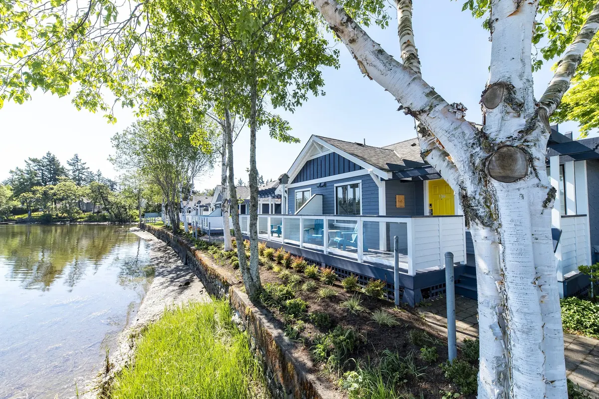 The buildings along the waterway, seen from the path